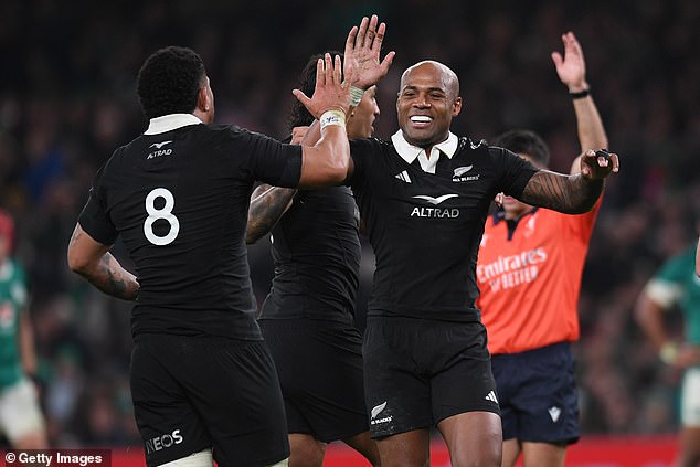 New Zealanders Mark Tele'a and Ardie Savea celebrate good work