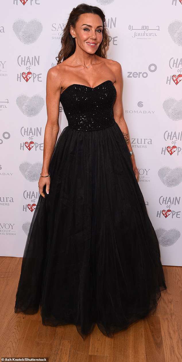 Michelle Heaton put on a glamorous show as she arrived at the event in a busty sleeveless black dress with sequins at the top and a tulle-style skirt