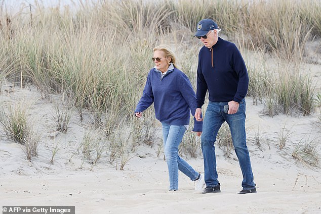 Biden shuffled nervously across the dangerous terrain and appeared to almost completely lose his balance, while his wife stayed on her feet.