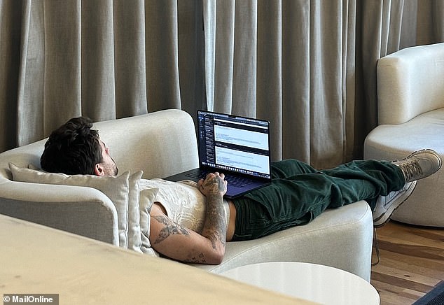 Liam looks at his laptop in the lobby of the Casa Sur Hotel in Buenos Aires on Wednesday at 4:26 p.m. The alarm went off after his fall at 5:04 p.m