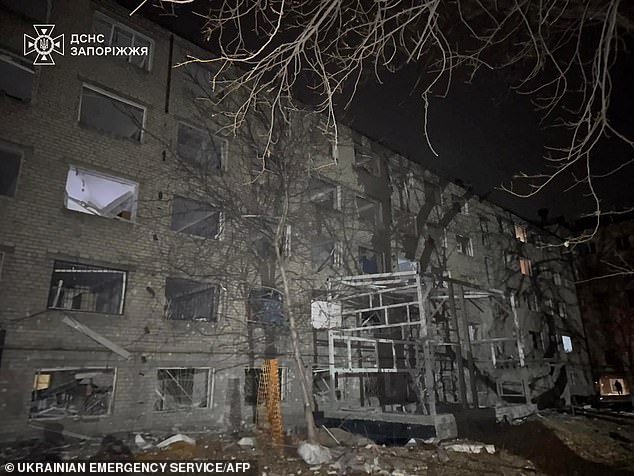 A residential building hit by a Russian airstrike in Zaporizhia this morning