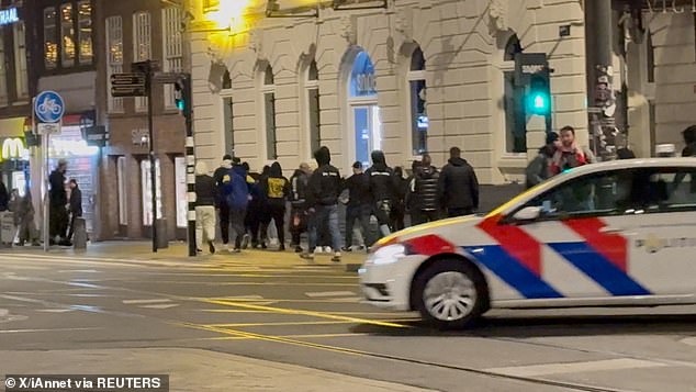 Israeli football supporters and Dutch youth clash at Amsterdam Central Station, in Amsterdam, Netherlands, November 8, 2024