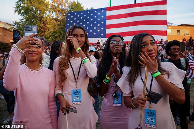 advocates react while another takes a selfie as Democratic presidential candidate U.S. Vice President Kamala Harris makes remarks conceding the 2024 U.S. presidential election