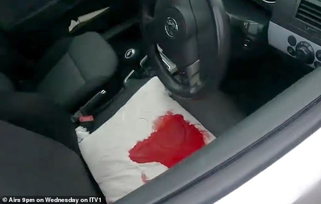 Blood on the car seat as Ahmed stabbed himself in the leg in an attempt to frame Mr Mohammed