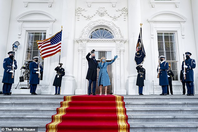 Joe and Jill Biden enter the White House on Inauguration Day 2021 - the Trumps had already left and did not greet their successors