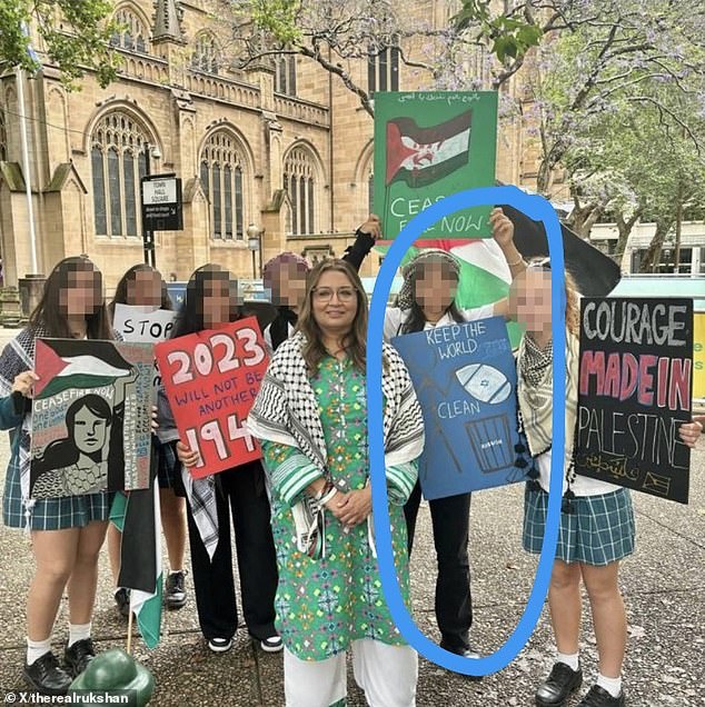 Federal Greens Vice-President Mehreen Faruqi posed in a photo next to a sign reading 'keep the world clean' with an Israeli flag above a garbage bin