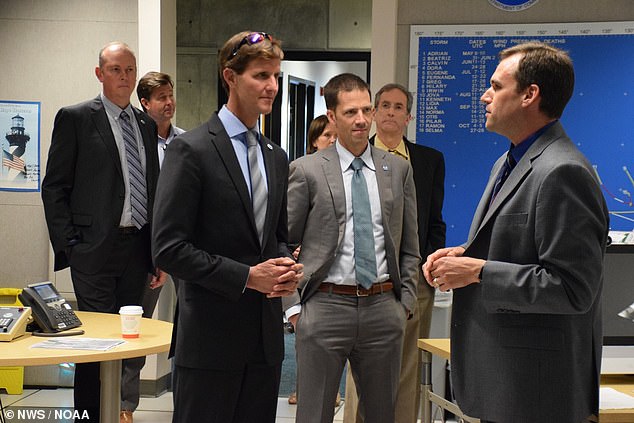 Above, Deputy Admiral Gallaudet while serving as deputy administrator at the National Oceanic & Atmospheric Administration (NOAA), during a tour of a National Weather Service office