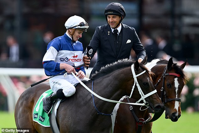 McDonald, pictured in conversation with NRL legend and horse racing reporter Billy Slater, won more than $320,000 in four days at the Melbourne Cup Carnival