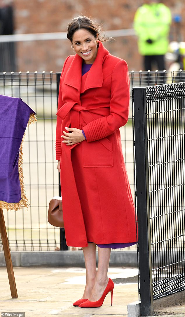 During a visit to Birkenhead in Merseyside in 2019, Meghan made a striking statement in a deep red wool coat from Canadian brand Sentaler