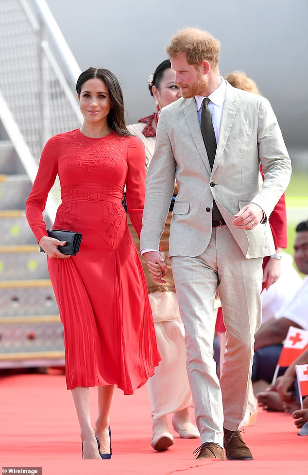 Meghan turned heads when she arrived in Tonga with Prince Harry in October 2018, wearing an understated £380 dress from Self-Portrait