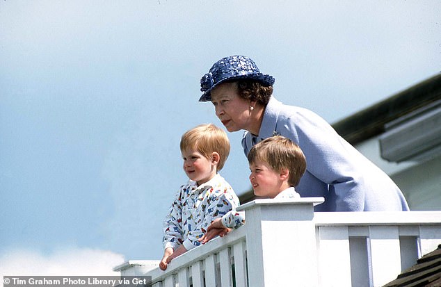 The Queen watches a polo match with grandsons Harry and William in 1987