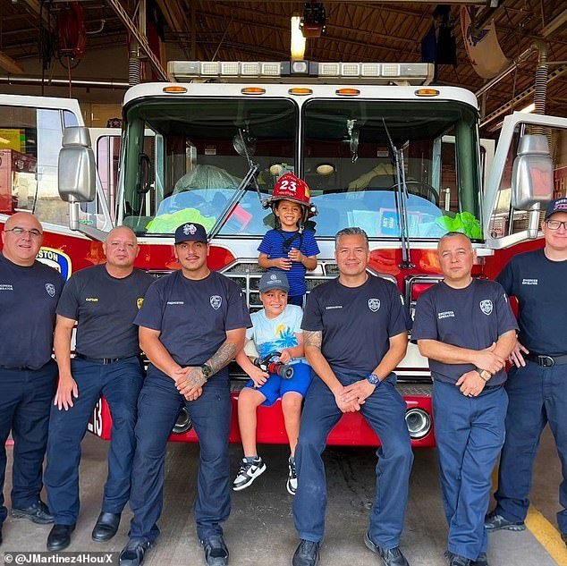 The fallen firefighter (center right) has worked for the department for 10 years, spending the last six months at Station 23