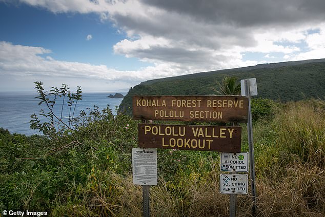 Pule-Fujii, one of many stewards, greets and guides visitors, while also warning them of the potential dangers on land