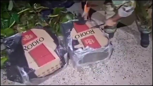 Police discovered he had packed 200 packs of 'Rodeo King Size' cigarettes into four black boxes