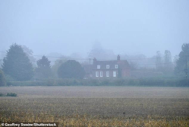 Characterized by gray skies, fog and low cloud, this means the sky is a uniformly dull color - with the sun nowhere to be seen. Pictured is a house in Dunsden, Oxfordshire, after dark on November 6