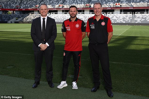 There was much buzz surrounding Mata (centre)'s arrival at the club, with Stajcic (right) praising the midfielder's work rate.