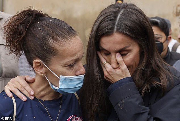 Queen Letizia appeared to be crying as she spoke to a woman in Paiporta on November 3