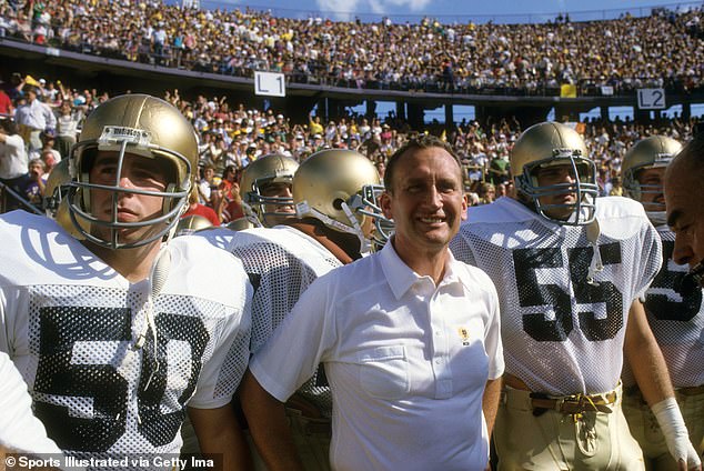 Faust, seen here with his players, during a game against LSU in Baton Rouge, LA in 1984