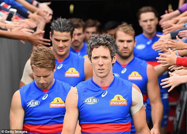 Vella will take charge of ABC Radio's breakfast show in Melbourne, alongside co-host and former Western Bulldogs captain Bob Murphy (pictured)