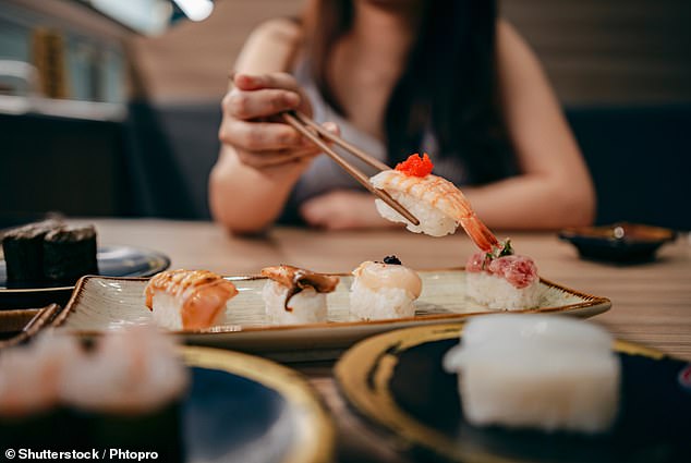 Sushi is a popular choice for a 'healthy' meal, but it's not always as balanced as it seems (stock image)