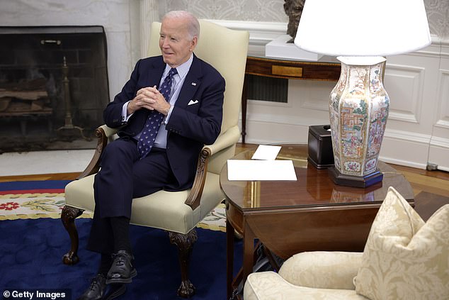 President Joe Biden sits in the Oval Office on Tuesday. He and Vice President Kamala Harris had lunch at the White House on Tuesday, a week after she lost the presidential election to former President Donald Trump.