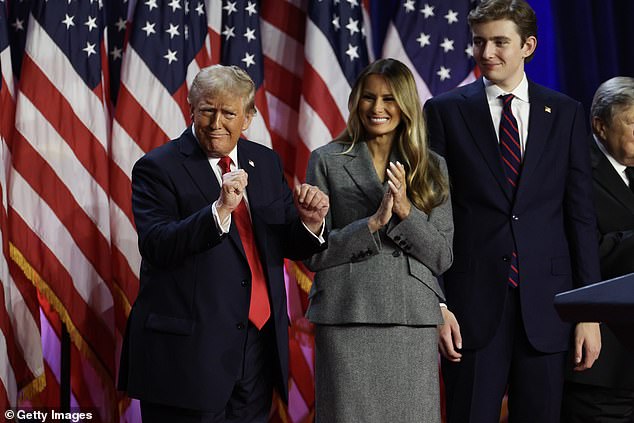 Donald Trump (pictured with his wife Melania and son Barron during a victory speech during his election) was previously branded a 'village idiot' and a 'traitor to the West' by former Australian Prime Minister Kevin Rudd