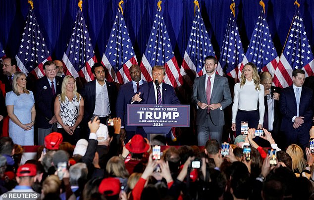 Leavitt (far left) on stage with key members of the Trump world on the night of the New Hampshire primary in Nashua, including Rep. Marjorie Taylor Greene, Eric and Lara Trump, Sen. Tim Scott and former presidential candidate Vivek Ramaswamy