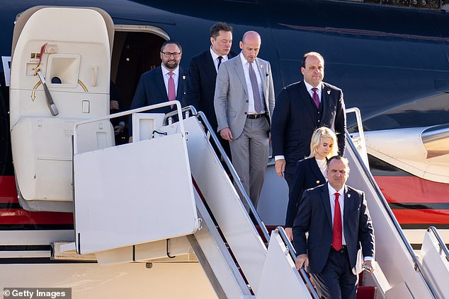 Elon Musk was seen disembarking from the plane with members of Trump's team