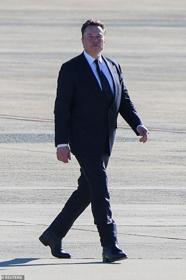 Tesla CEO and X owner Elon Musk walks on the tarmac of Joint Base Andrews in Maryland, U.S., November 13, 2024.