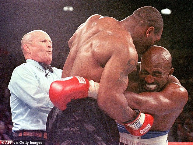 Tyson was disqualified for biting off Holyfield's ear during the 1997 rematch