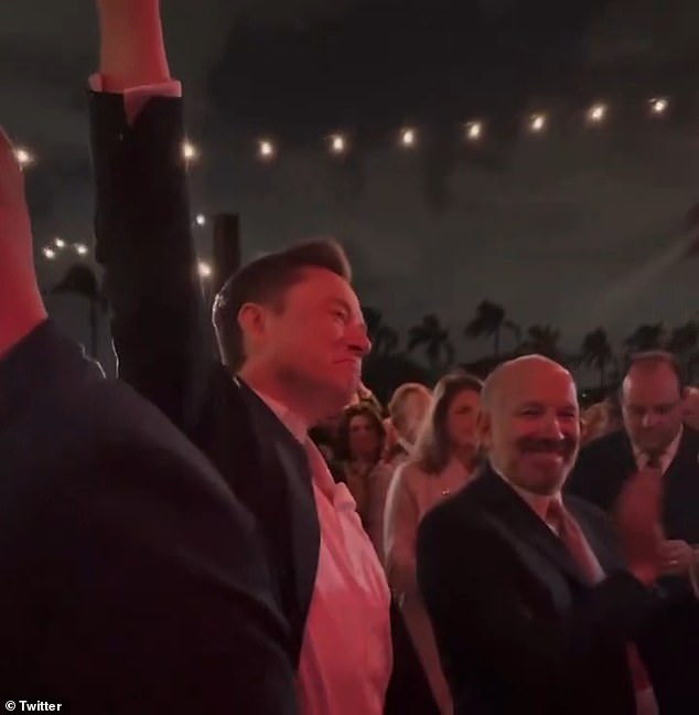 The pair appeared in several videos posted to social media throughout the night, including one in which Musk quickly and awkwardly raised his hand after someone asked, 