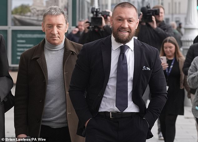 Conor McGregor with his father Tony McGregor (left) outside the High Court in Dublin