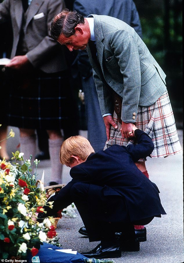 Prince Charles and Prince Harry following the devastating news that Diana had died in an accident in Paris the night before