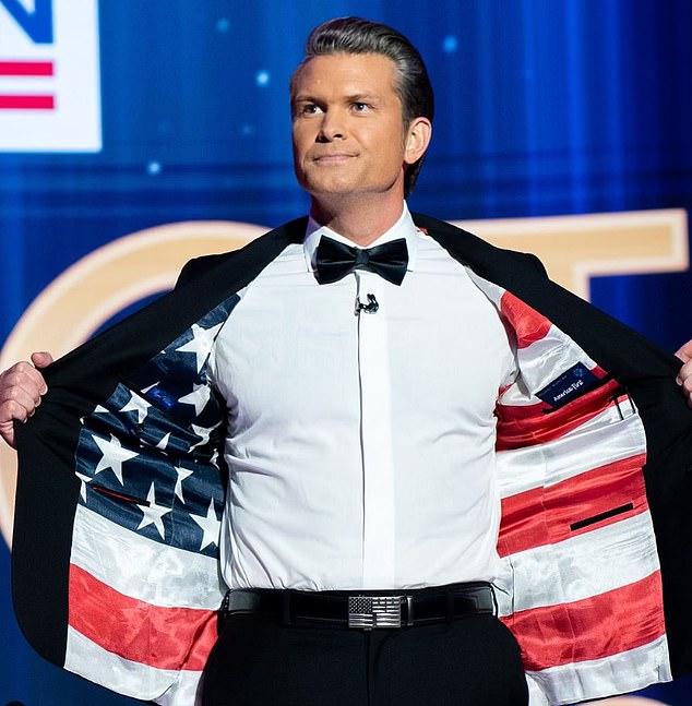 Hegseth wears a tuxedo, lined with an American flag and with a muted flag buckle