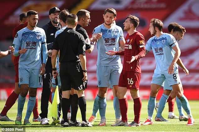 Coote (pictured confronted by Liverpool's Andy Robertson) reportedly called the defender a 'Scottish p****'