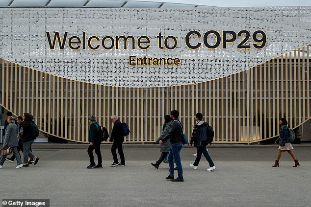 Delegates arrive for the UNFCCC COP29 climate conference on November 11