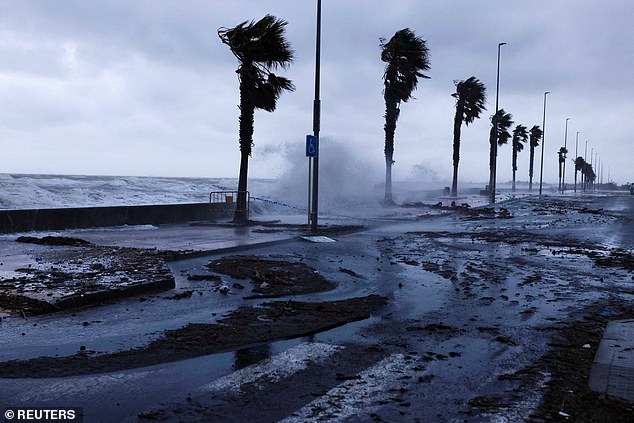 Waves crashed onto the promenade of the Ebro Delta Nature Reserve, one of the largest wetlands in the western Mediterranean, during the autumn storm system that devastated Spain