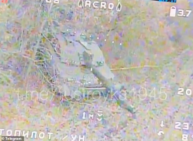 Footage shared by the Troika Milblogging Telegram channel showed an FPV drone descending on British armor protruding from some bushes