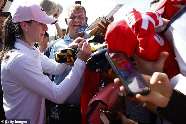 Clark was mobbed around the course, with fans desperate for her autograph