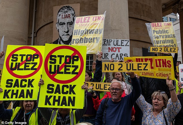 Protesters opposing the expansion of London's Ultra Low Emissions Zone demonstrate outside BBC Broadcasting House in London on July 22, 2023