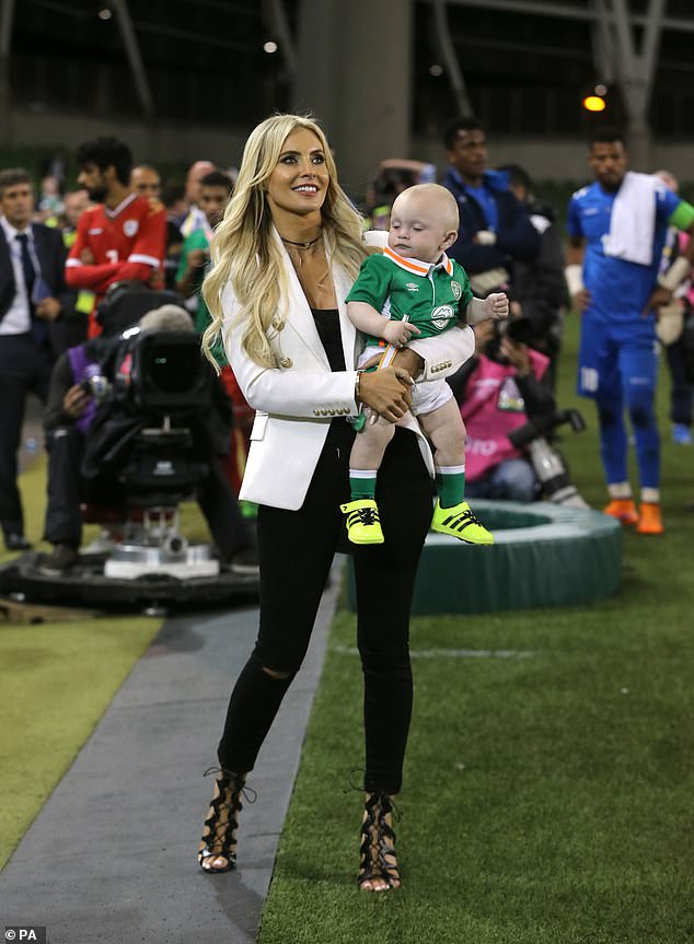 Robbie Keane's wife Claudine is seen with the couple's son Hudson, now nine, at the Aviva Stadium in Dublin in August 2016