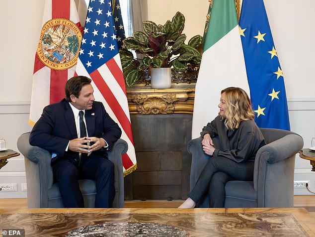 A handout photo made available by the Chigi Palace press office shows Italian Prime Minister Giorgia Meloni (R) with Florida Governor Ron DeSantis (L) during their meeting at the Chigi Palace in Rome, Italy. DeSantis faces some big political decisions when he returns