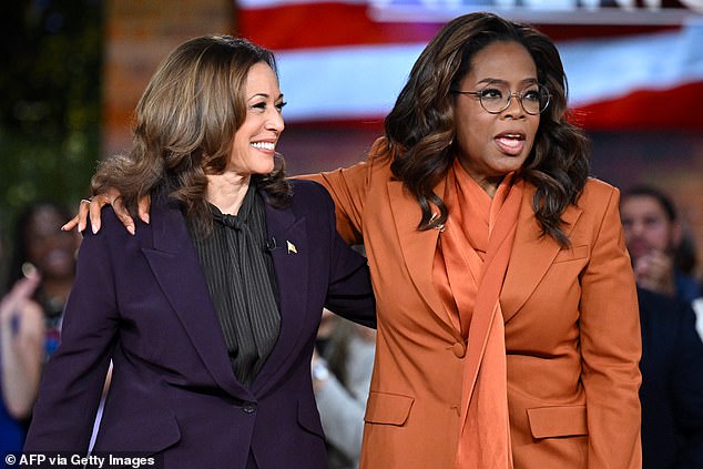 U.S. Vice President and Democratic presidential candidate Kamala Harris (L) joins U.S. television producer Oprah Winfrey during a 'Unite for America' livestream rally in Farmington Hills, Michigan, on September 19, 2024