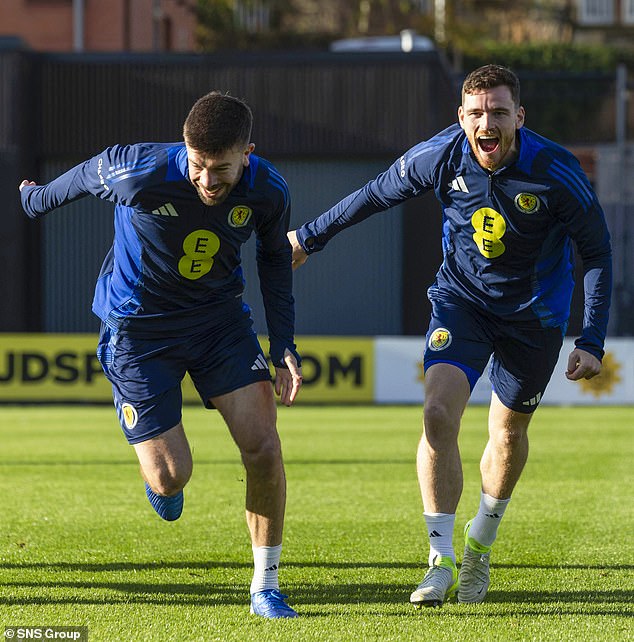 Grant Hanley and Andy Robertson were in good spirits in training at Lesser Hampden