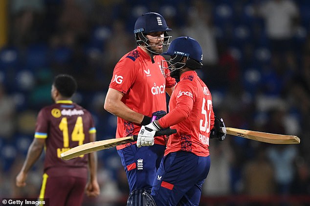 Rehan Ahmed (right) scored the winning runs as England won their first T20 series away from home in more than two years