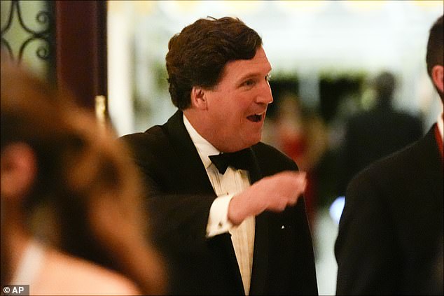 Tucker Carlson arrives before President-elect Donald Trump speaks at an America First Policy Institute gala at his Mar-a-Lago estate