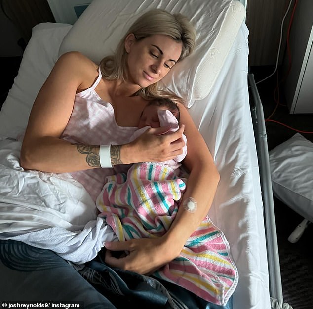 Reynolds' partner Ciarne Denham cradles her baby girl, who is named after two special family members