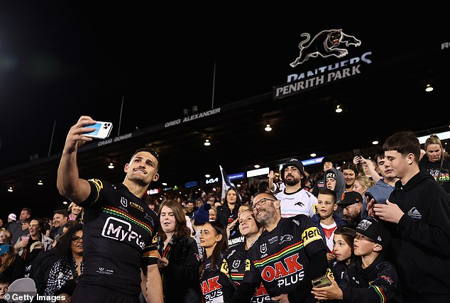 Western Sydney sports fans - like these supporters with Penrith star Nathan Cleary at a Panthers match - are only getting medium strength beer, despite liquor licenses allowing its sale