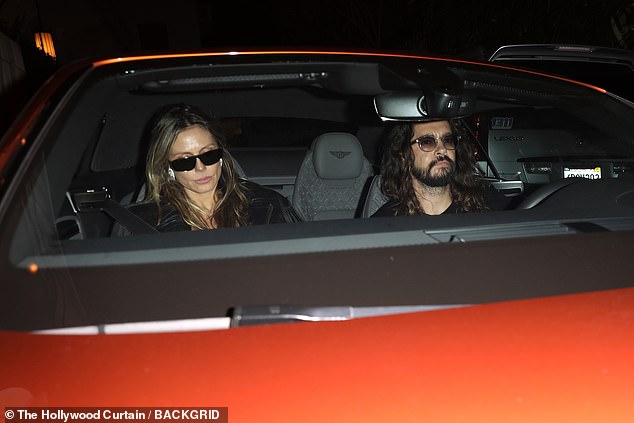 The couple was spotted leaving Chateau Marmont in their sleek orange Bentley, with Kaulitz, 35, behind the wheel and Klum, 51, sitting in the front passenger seat