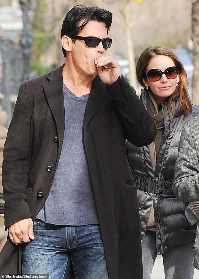 The star is seen smoking with ex-wife Diane Lane in 2011